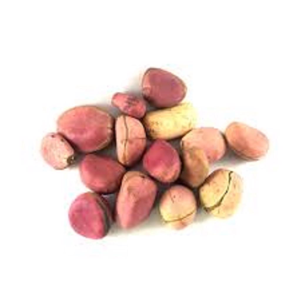 Product image - The kola nut is the fruit of the kola tree (Cola acuminata and Cola nitida), indigenous to West Africa. The trees, which reach heights of 40 to 60 feet, produce a star-shaped fruit. Each fruit contains between two and five kola nuts. About the size of a chestnut, this little fruit is packed with caffeine.