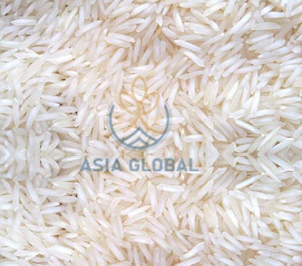 Product image - Basmati, the long grains with discrete fragrance, are grown in a specified geographical area, the himalayan foothills of the Indian sub-continent, since years. The extremely long grains elongate at least twice upon cooking. They also boast of soft and delicate fluffy texture, taste of excellence, tempting flavor and magical aroma. Its long and slender grains make it unique among other varieties of long grain rice wit
