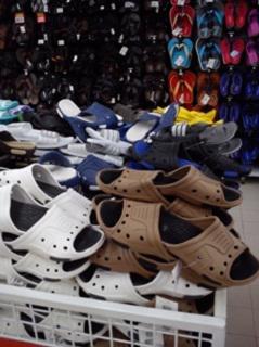 Product image - (HS 640419). Consist of: sport shoes, EVA sandal, leather sandal, leather shoes, golf shoes, slippers, sneakers, etc.. Injection and cementing method. Upper: PVC, Canvas and PU. Outsole: PVC compound or TPR. Insole: EVA + fabrics. Packaging: carton box per pair. OEM welcome. Product of Indonesia. Contact: +6285892224657 (whatsapp, viber). 1 Unit = 1 pair.