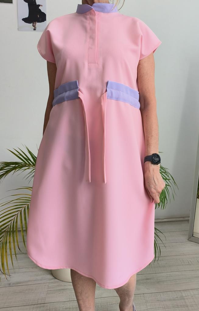 Product image - Maternity friendly adjustable scrub dress. Made from good quality, easy to care fabrics. Available in various dark or bright colours with or without contrast. Sizes range from 28 to 50.