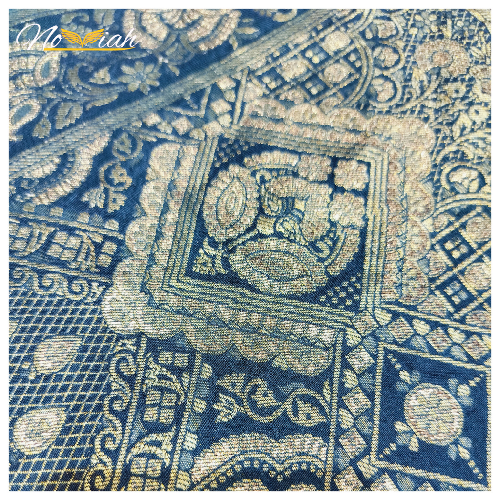 Product image - Embrace elegance and luxury with our exquisite Russian Silk Saree. Crafted with precision and adorned with intricate designs, this saree is a true symbol of grace. Step into the spotlight and make a statement with this timeless masterpiece. 