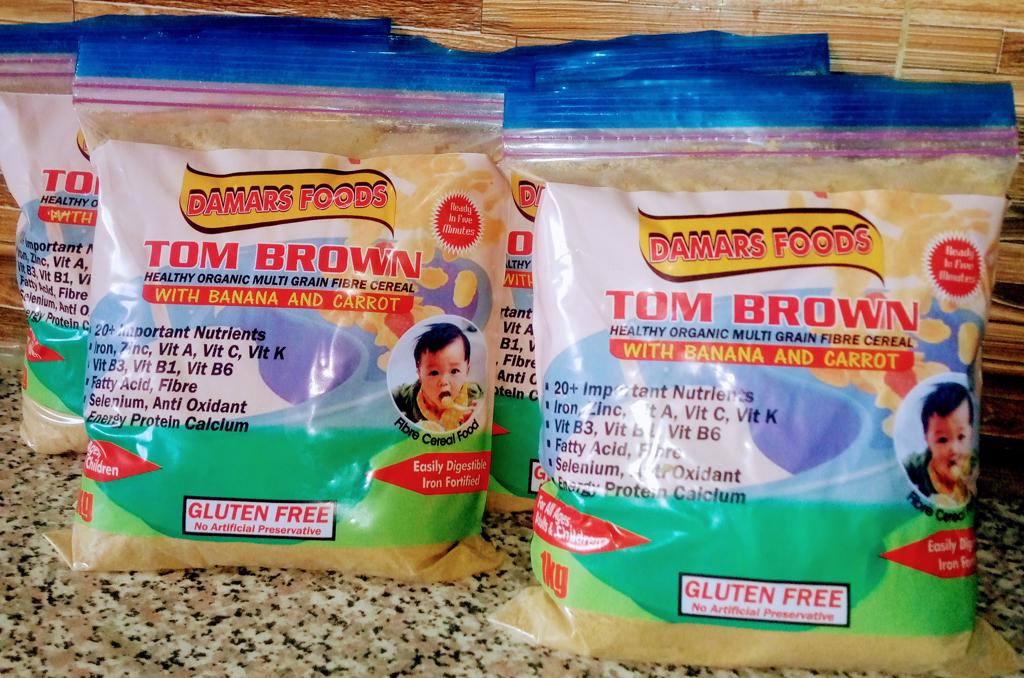 Product image - Damars Tom Brown is an organic multi grain cereal which is made from (1) Corn (2) MILLET (3)  SOYABEAN (4) Guinea Corn (5) Tiger but (6)Dates (7) Banana( 8) Carrot (9) Fish (10) Crayfish (11) Beans. It is a healthy cereal which is good for all ages and all health status. It is very good for babies ,it makes them healthy and Chubby, it increases lactation, control blood sugar and it is good for other health status.