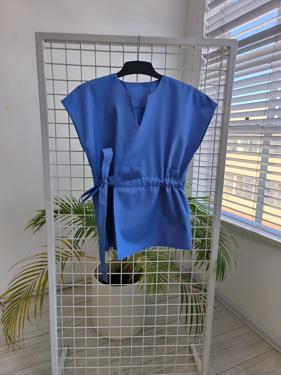Public product photo - Maternity friendly adjustable scrub top. Made from superior quality 65/35 poly cotton twill fabric. Available in various colours. Sizes range from 28 to 50.